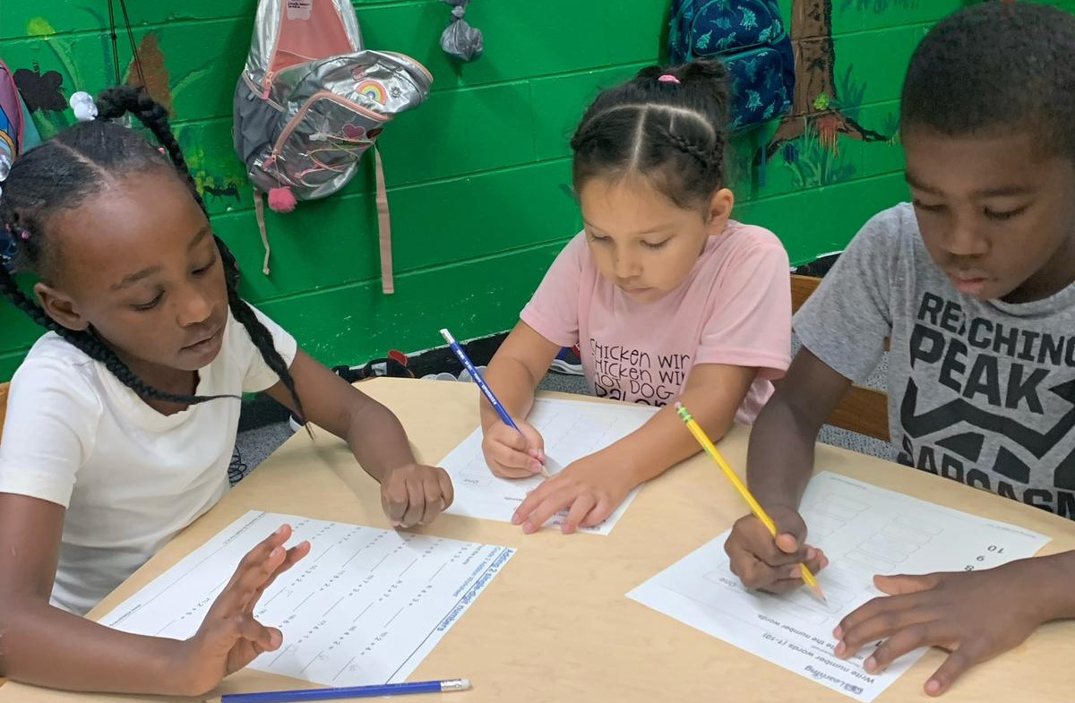 Child learning with structured programs at daycare in Lansing, Illinois